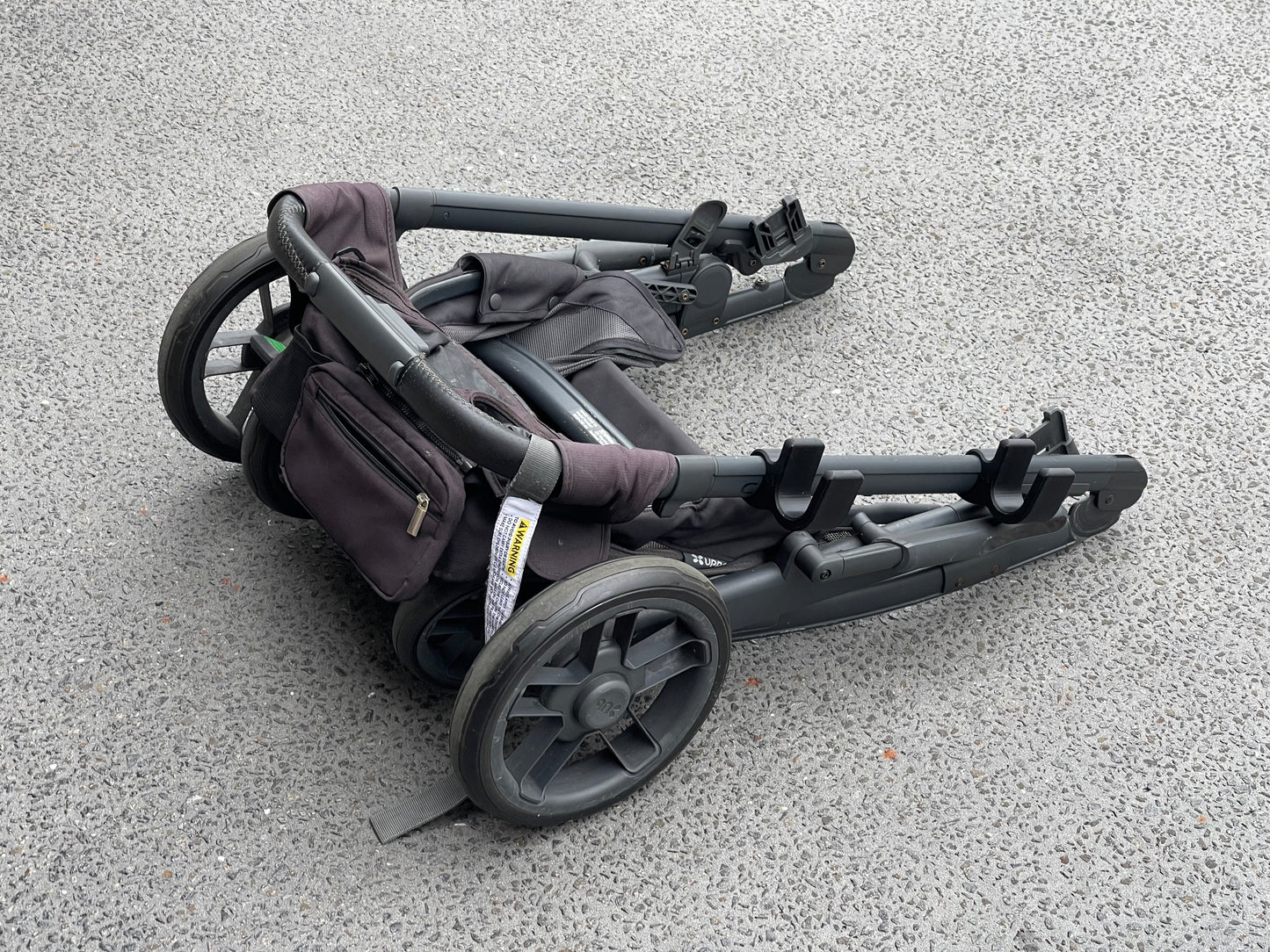 Balance bike / scooter holder for pram