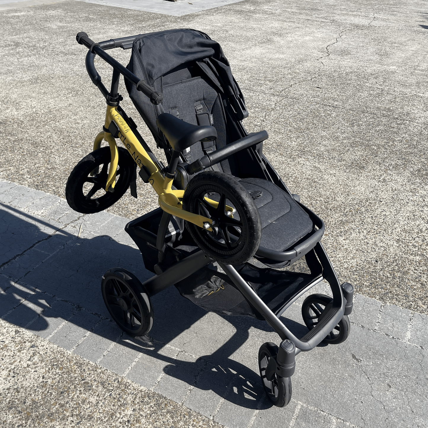 Balance bike / scooter holder for pram