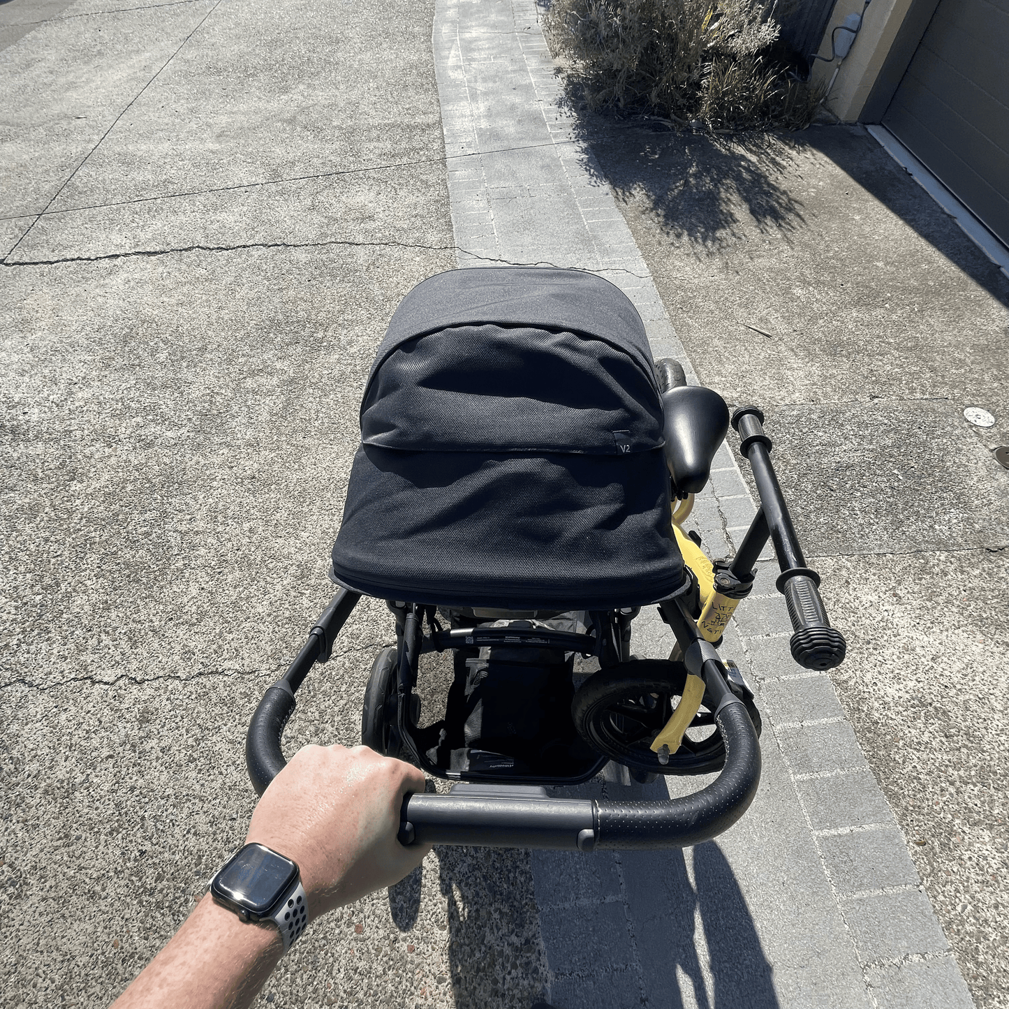 Balance bike / scooter holder for pram